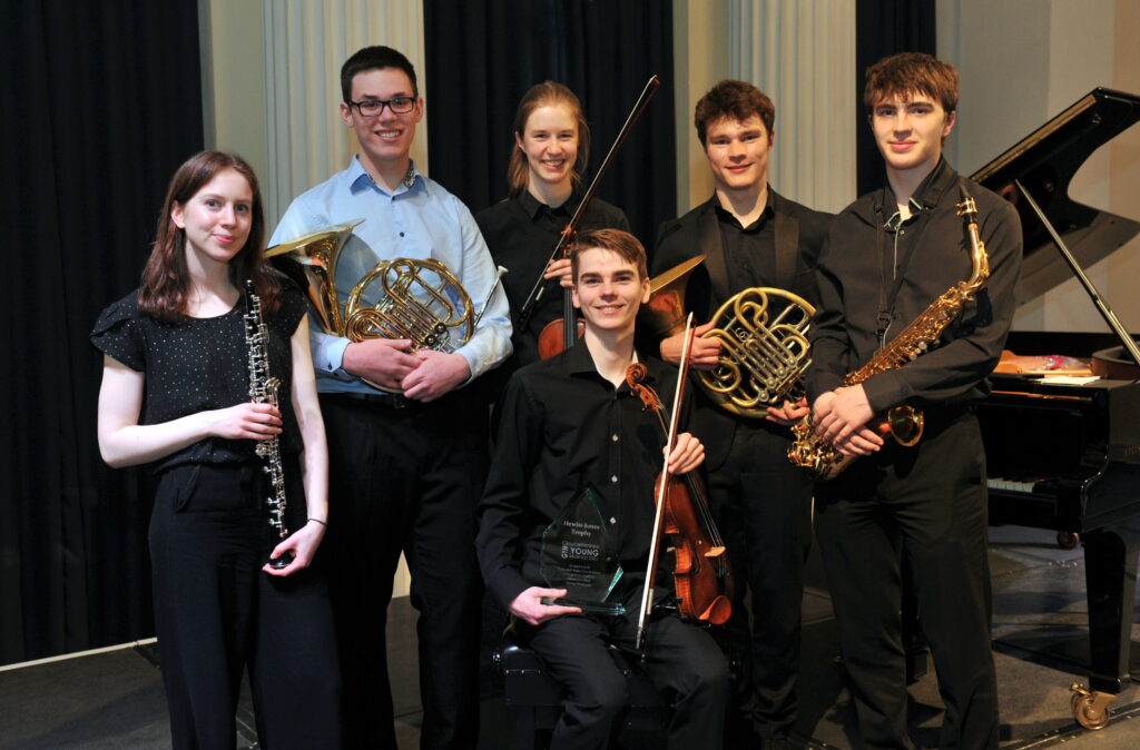 WINNER Isaac Williams (seated) with finalists, from left, Grace Tushingham, Bertie McVittie, Elizabeth Nunn, Sebastien Barley and Billy Keenan.jpg